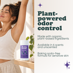 Woman stretching with Pretty Frank baking soda free natural deodorant stick on a shelf nearby